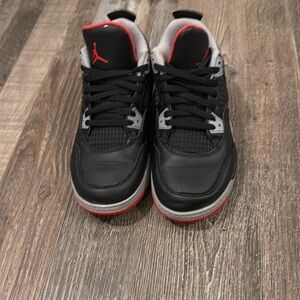 Jordan Black and Red Sneakers with Air Cushioning
